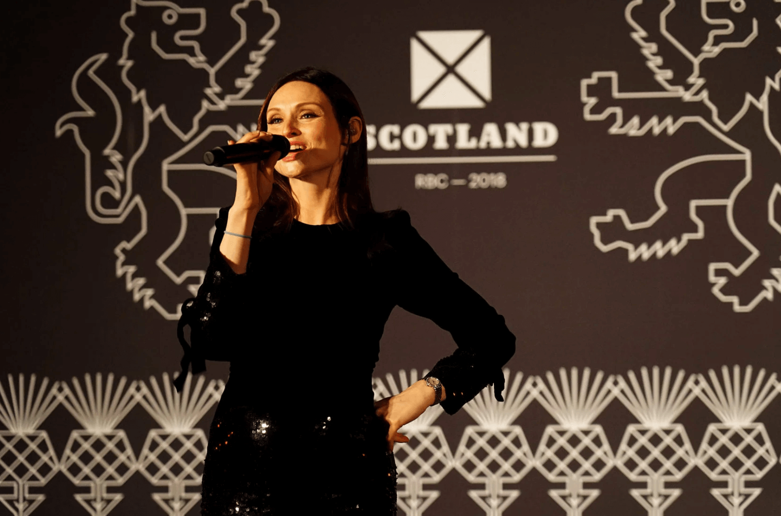 Lady on Mic in Scotland'
